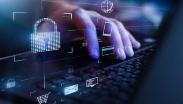 Data protection and secure online payments. Cyber internet security technologies and data encryption . Closeup view of man`s hand using laptop with virtual digital screen with icon of lock on it.