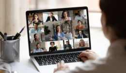 Female employee have webcam team meeting online