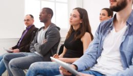 Group of people sitting at seminar