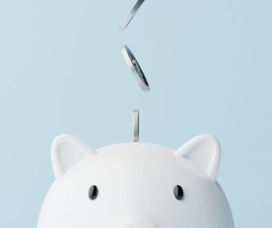 Save money and investment concept. Closeup piggy bank and silver coins falling. 3d rendering illustration