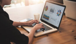 Businesswoman using laptop for her work at the office.