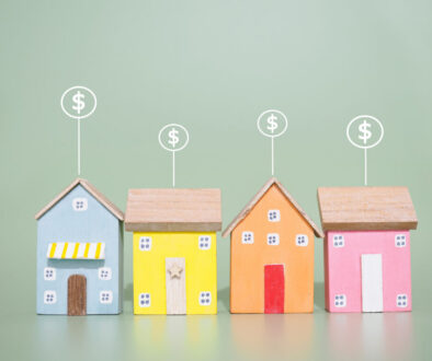 Miniature house and Dollar coin icons. The concept of price of house, Property investment, House mortgage, Real estate