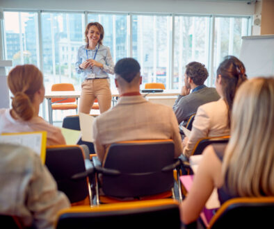 Senior business woman holding presentation